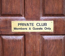 Naklejka premium Private club door sign for members and guests.