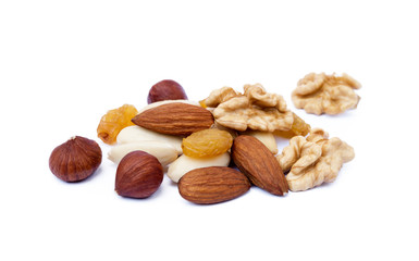 Mixed fresh nuts and raisins isolated on white background