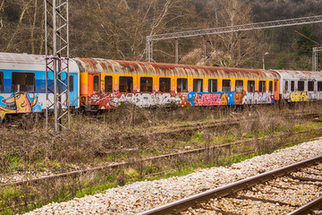 Fototapeta premium Belgrade, Serbia March 21, 2016: Abandoned and destroyed trains