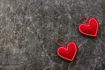 Obraz premium Red beautiful hearts on a marble background. Valentine's Day. 