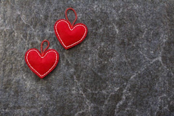 Red beautiful hearts on a marble background. Valentine's Day.
