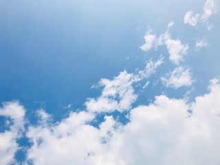 Bright sky with white cloud.