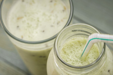 Smoothie of kiwi in a bottle