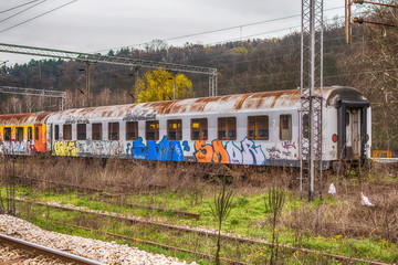 Fototapeta premium Belgrade, Serbia March 21, 2016: Abandoned and destroyed trains