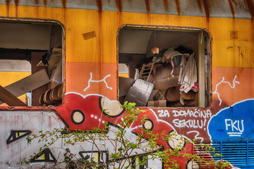 Fototapeta premium Belgrade, Serbia March 21, 2016: Abandoned and destroyed trains