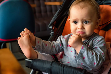 Very expressive and emotional girl watching tv