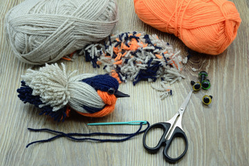 creating utensils to make yarn bird bullfinch