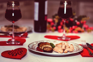 Romantic dinner for two with wine, heart, flowers