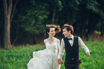 Attractive Couple Enjoying Romantic Sunset Picnic in the Country