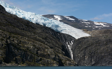 Glacier fed waterfall with Glacier above
