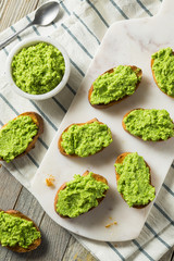 Sweet Homemade Pea Pesto Crostinis