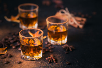 Whiskey, brandy or liquor, spices, anise stars, coffee beans, cinnamon sticks