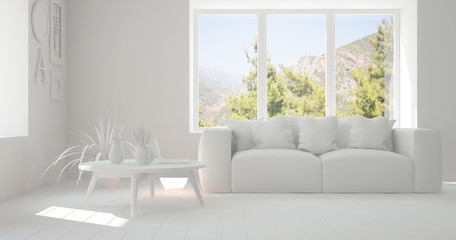 Fototapeta premium Idea of white room with sofa and summer landscape in window. Scandinavian interior design. 3D illustration