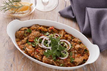 meat and vegetables in tomato sauce, Georgian dish, chashashuli