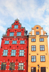 Red and Yellow iconic buildings on Stortorget, a small public square in Gamla Stan, the old town in central Stockholm, Sweden