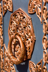 Forged handle of an old door.