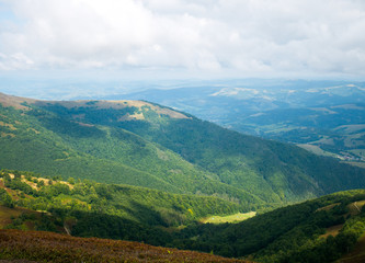Fototapeta na wymiar Stunning mountain landscape. The mountain range in the Carpathians. View from the mountain Gemba, (Pylypets, Zakarpatska oblast, Ukraine)