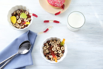 Cereal with gummy worms in bowls. April fools food