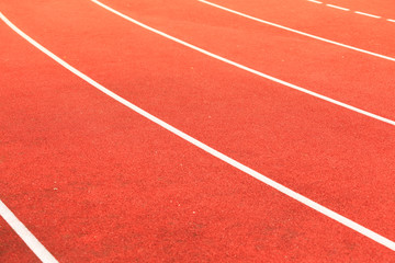 Fototapeta premium Red running track in stadium.