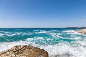 Rocky shore of the Adriatic sea after storm