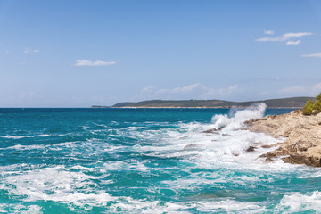Rocky shore of the Adriatic sea after storm