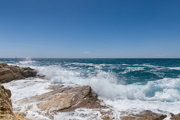 Rocky shore of the Adriatic sea after storm