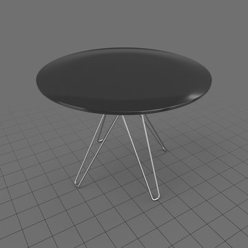 Outdoor table with curved legs