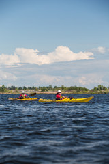 Fototapeta na wymiar Group of sea kayakers on Georgian Bay, in Ontario, Canada.