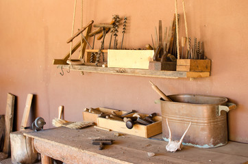 Wood workbench with old wood working tools