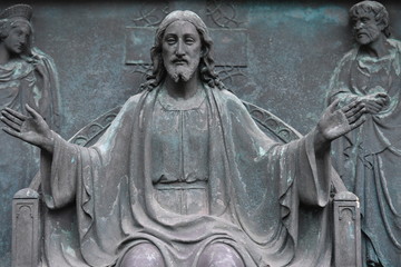 Obraz premium Weathered relief of Jesus Christ on a tombstone