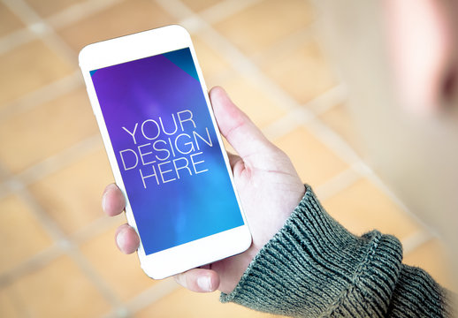 Smartphone Mockup with Hand on Tile Floor Background