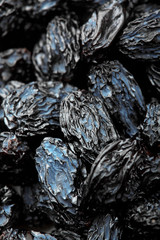 Close-up of dark raisins currant . Top view point.Black raisins texture.Selective focus