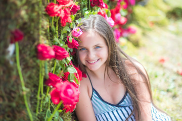 Fototapeta premium Little child with flowers, spring