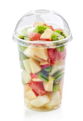 fresh fruit pieces salad in plastic cup