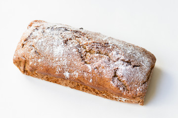 Whole banana bread on white background
