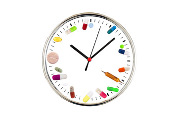 Concept of taking on time medication . Analog Clock with a dial made from various pills, capsule, tablets, and medicinal bulb on white background