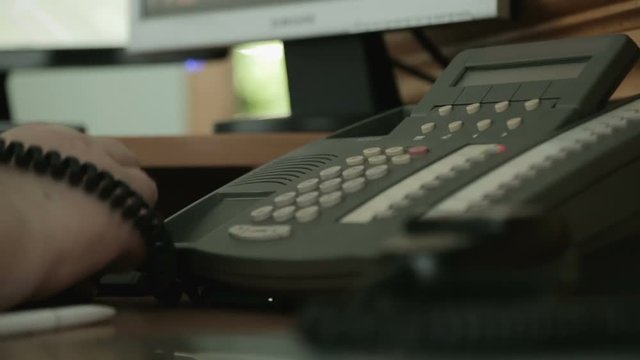 Call-center operator answering the phone, support service, helpdesk information