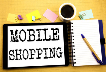 Mobile Shopping. Business concept for Cellphone online order Written on tablet laptop, wooden background with sticky note, coffee and pen