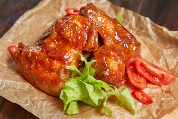 Baked chicken with sweet and sour sauce, meat with vegetables