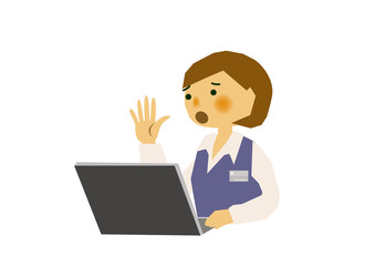 ノートパソコンで仕事する事務員の女性。