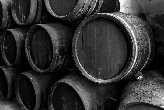 Old barrels for whiskey in black and white