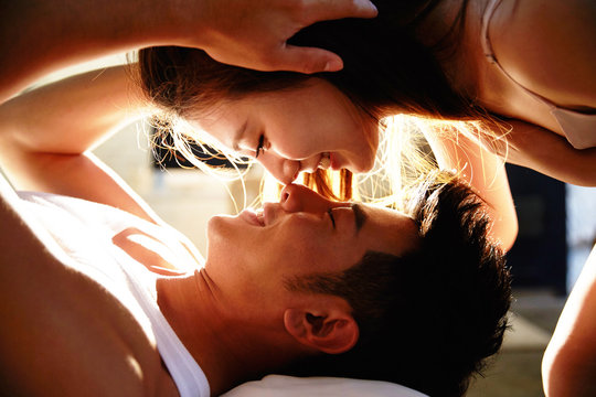 Close up of young couple touching noses