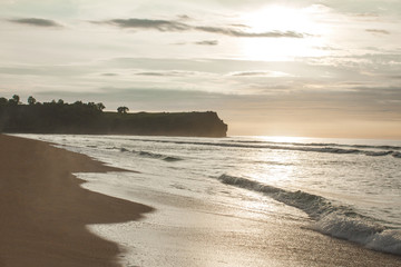 scenery of the sun that will going down at beautiful beach