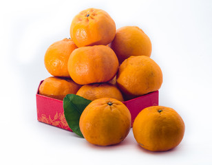 Stack of mandarines placed on the white background.