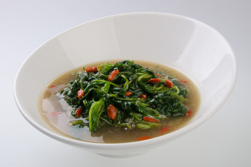 Vegetable soup on isolated white