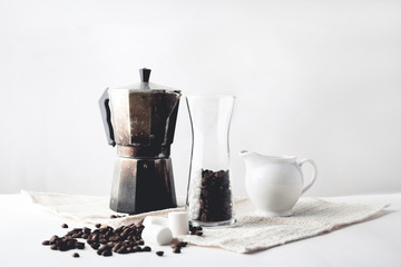 Arabica coffee in moka pot On a white background