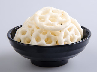 Junk food, potato ring on a background