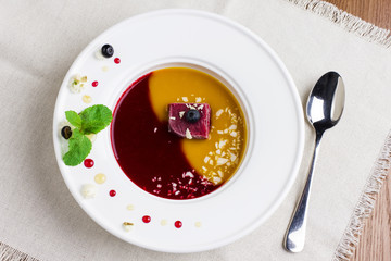 Organic raw food vegan berry ice cream soup in the bowl. The view from top