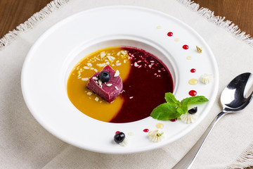 Organic raw food vegan berry ice cream soup in the bowl