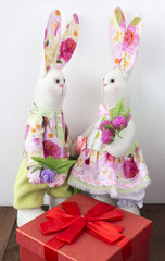 two Bunny Tilda stand on Valentine's Day